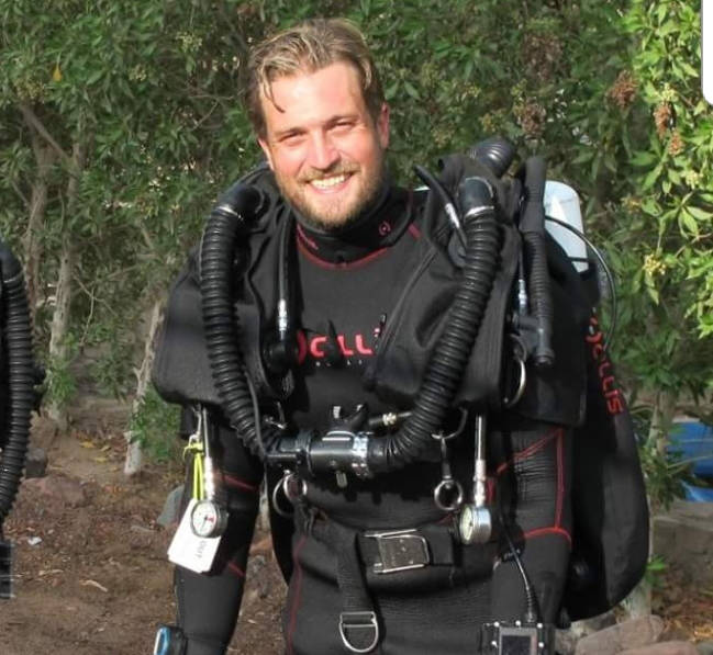 D.W. Poppy grad Erik Brown was part of a team of volunteer divers who rescued 13 people from a cave in Thailand. Photo courtesy Kirk Brown.
