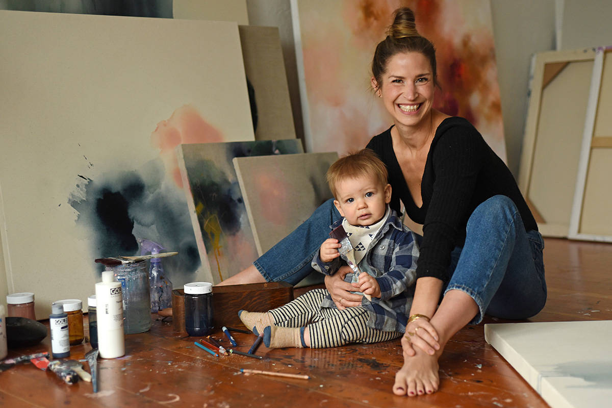 Artist Lauren Mycroft in her painting studio with son Rune. (Don Denton photography)