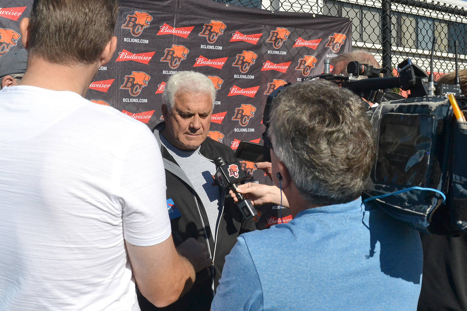 BC Lions coach Wally Buono, a South Surrey resident, speaks with the media after a practice earlier this month at the team’s training facility. (Nick Greenizan photo)