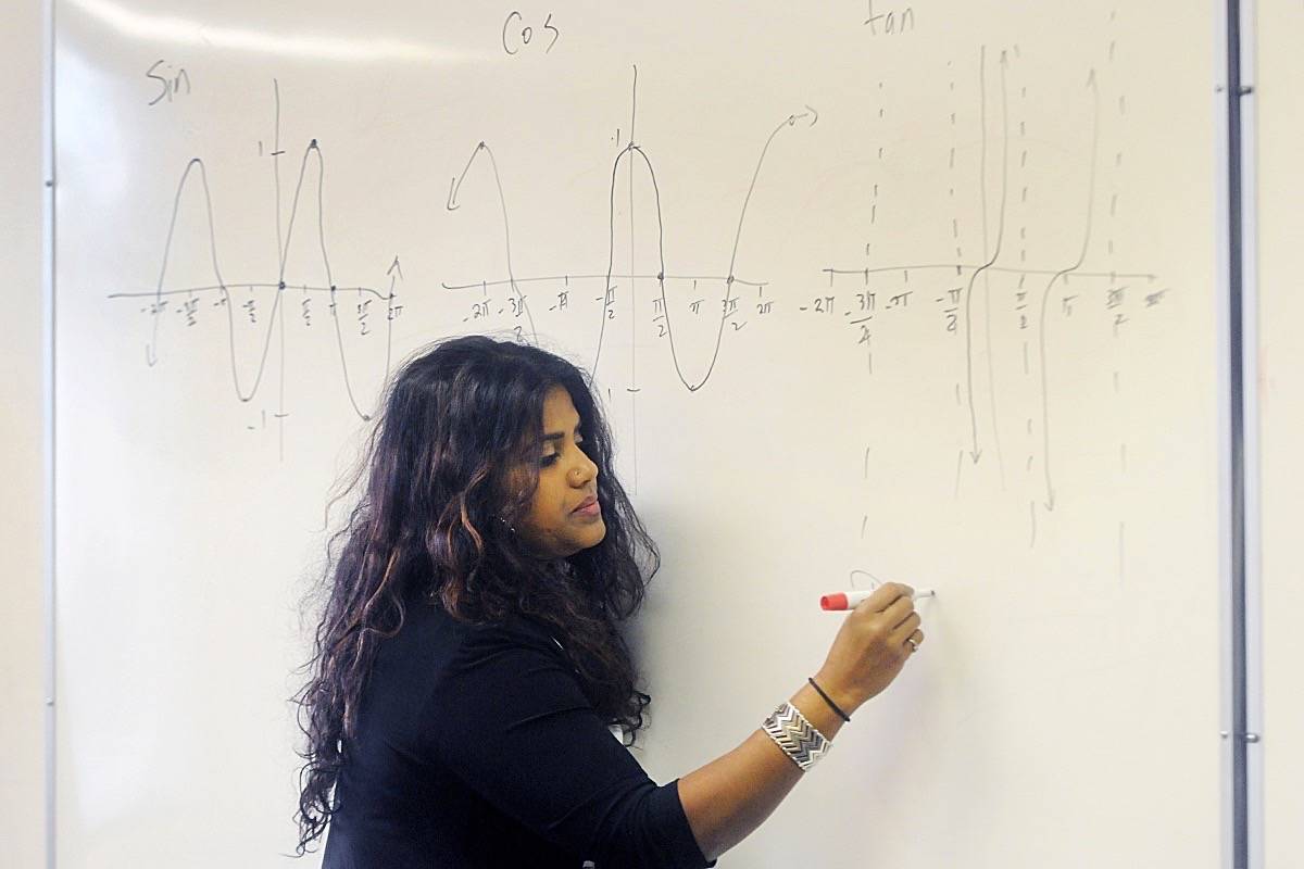Kohila Sivas tutors students in Maple Ridge. (Colleen Flanagan/THE NEWS)