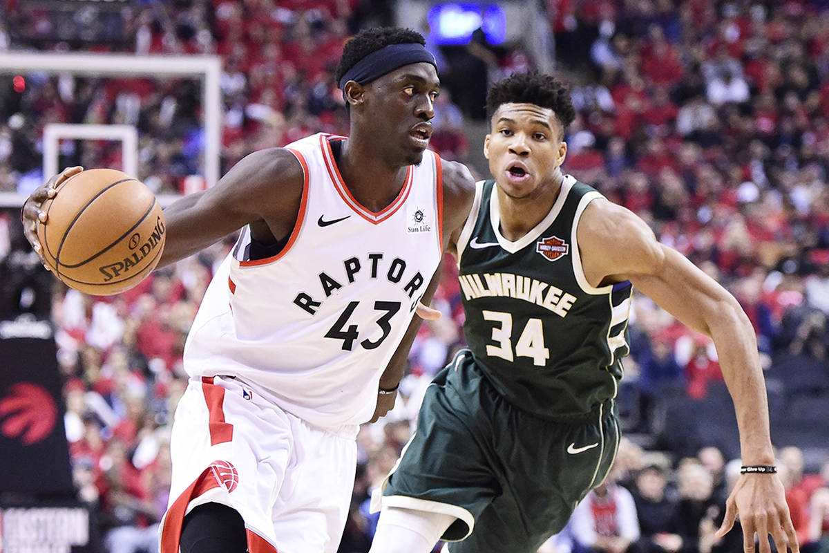 Toronto Raptors forward Pascal Siakam (43) moves up court as Milwaukee Bucks forward Giannis Antetokounmpo (34) defends during second half action in Game 4 of the NBA Eastern Conference final in Toronto on Tuesday, May 21, 2019. THE CANADIAN PRESS/Frank Gunn