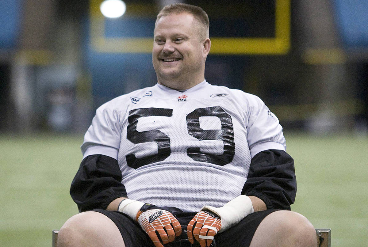 BC Lions Kelly Bates takes a seat following a team practice in Vancouver Wednesday, Nov 14, 2007. The B.C. Lions have sacked offensive line coach Bryan Chiu after a dismal start to the season. The club announced Saturday that former Lions guard Kelly Bates will take over the role.THE CANADIAN PRESS/Jonathan Hayward