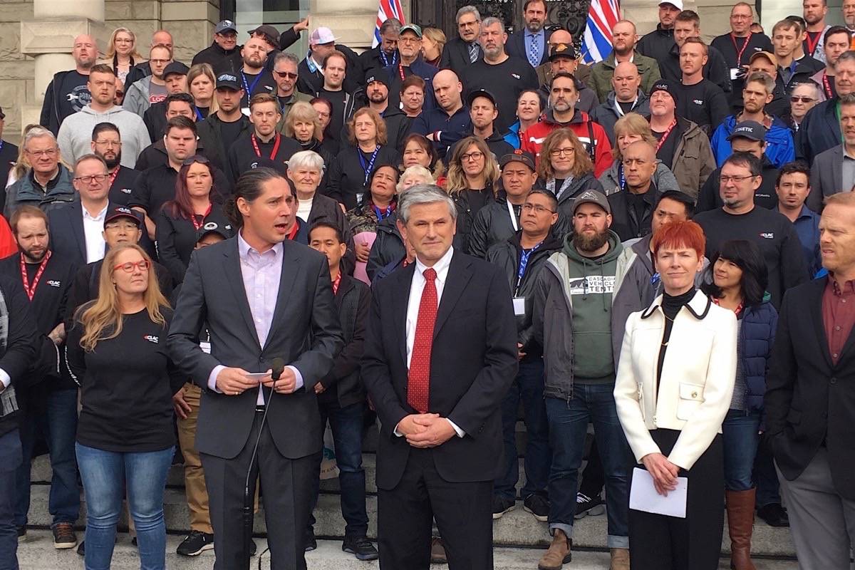 CLAC representative Ryan Bruce (left) introduces B.C. Liberal leader Andrew Wilkinson and Vancouver Regional Construction Association president Fiona Famulak to speak at rally with workers at the B.C. legislature, Nov. 19, 2019. (Tom Fletcher/Black Press)