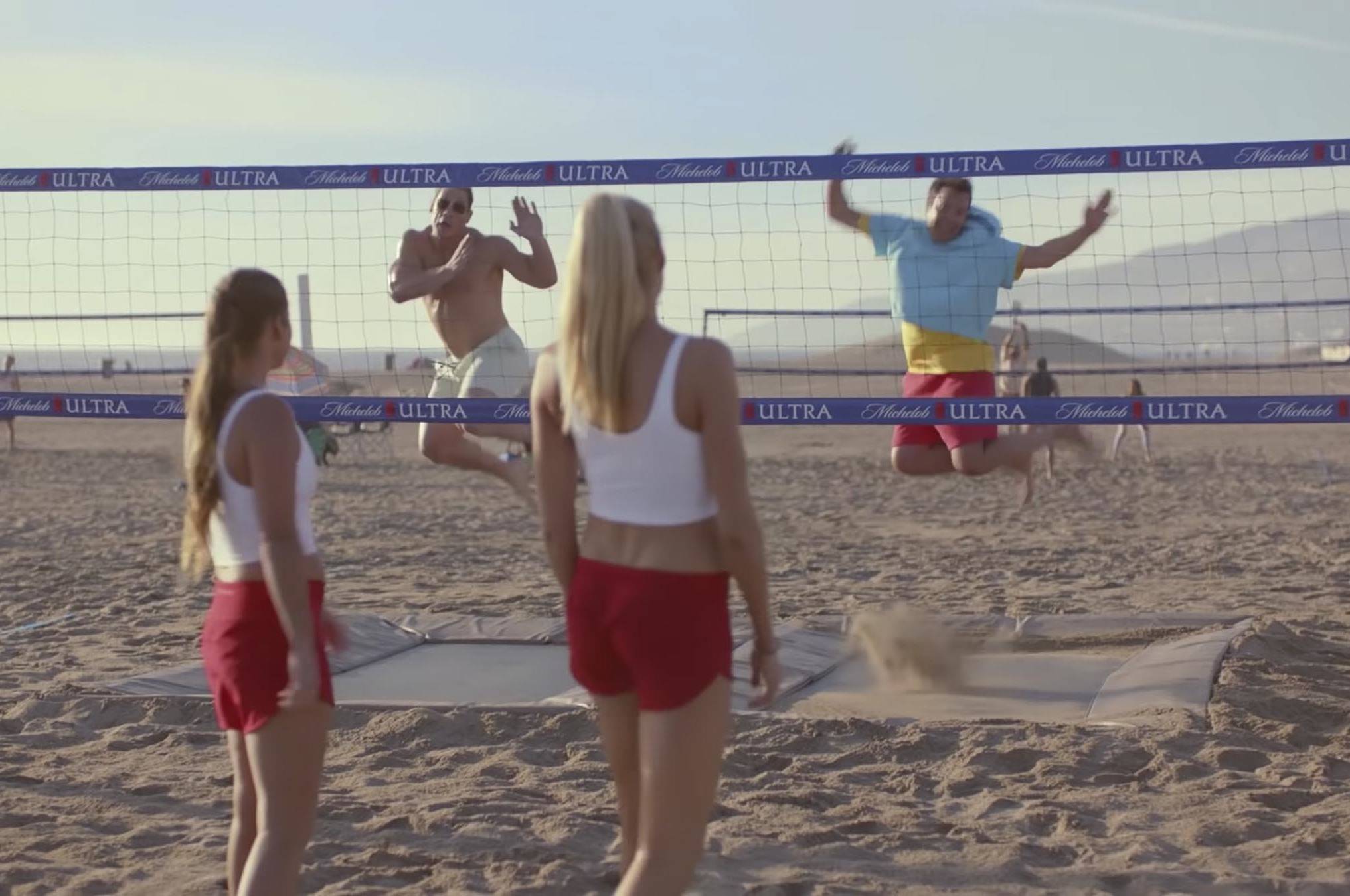 This undated image provided by Michelob ULTRA shows from left, Brooke Sweat, John Cena, Kerri Walsh Jennings and Jimmy Fallon in a scene from the company’s 2020 Super Bowl NFL football spot. (Michelob ULTRA via AP)