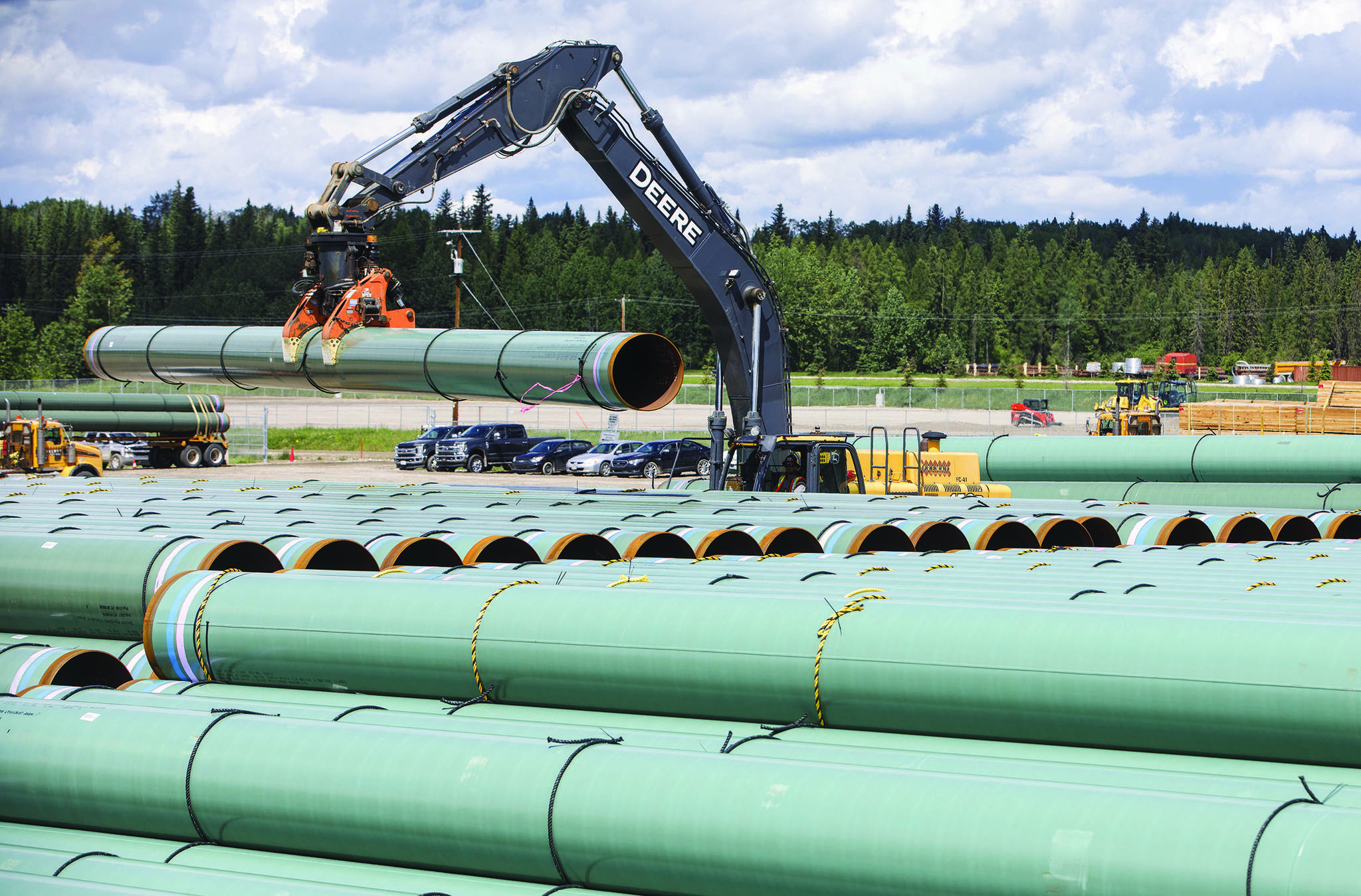 Pipe for the Trans Mountain pipeline is unloaded in Edson, Alta. on Tuesday June 18, 2019. The Federal Court of Appeal is set to release its decision on the latest challenge of the Trans Mountain pipeline expansion on Tuesday. THE CANADIAN PRESS/Jason Franson
