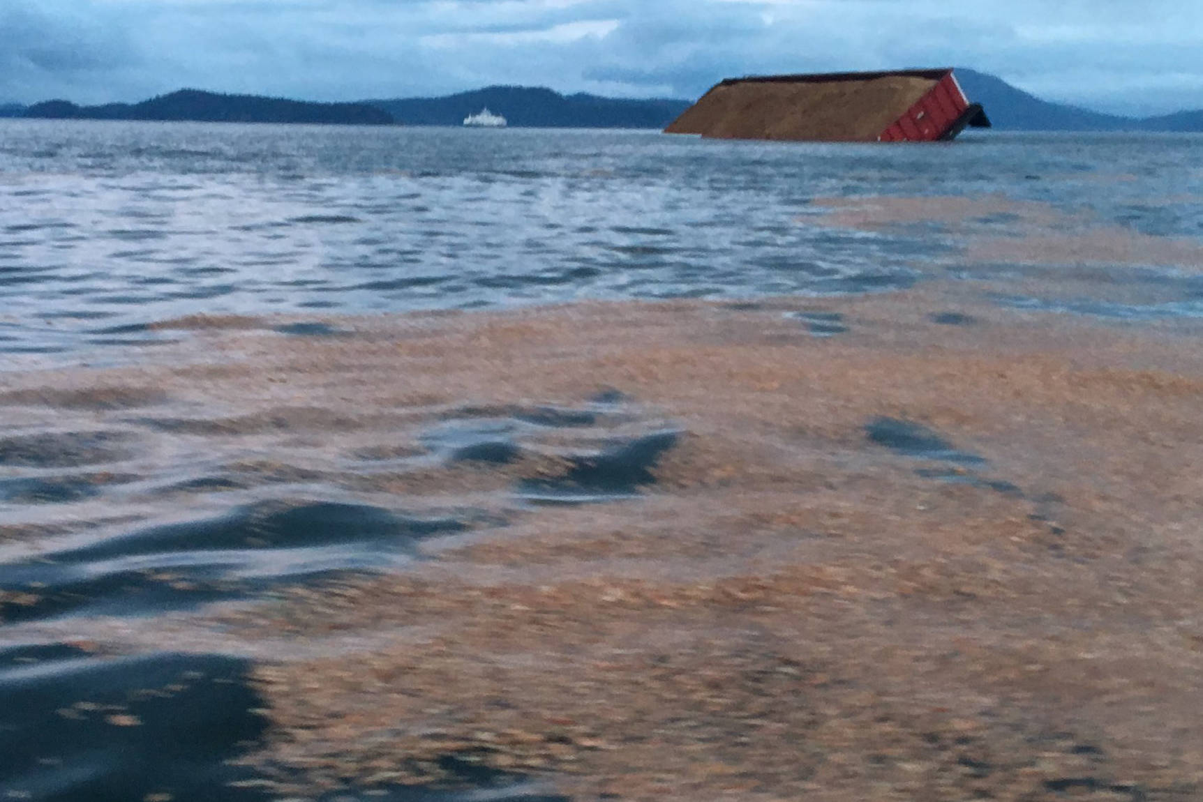 Wood chips float in the Salish Sea between Pender and Saltspring Islands on Wednesday morning. (Ian Hinkle Twitter)                                Wood chips float in the Salish Sea between Pender and Saltspring Islands on Wednesday morning. (Ian Hinkle Twitter)