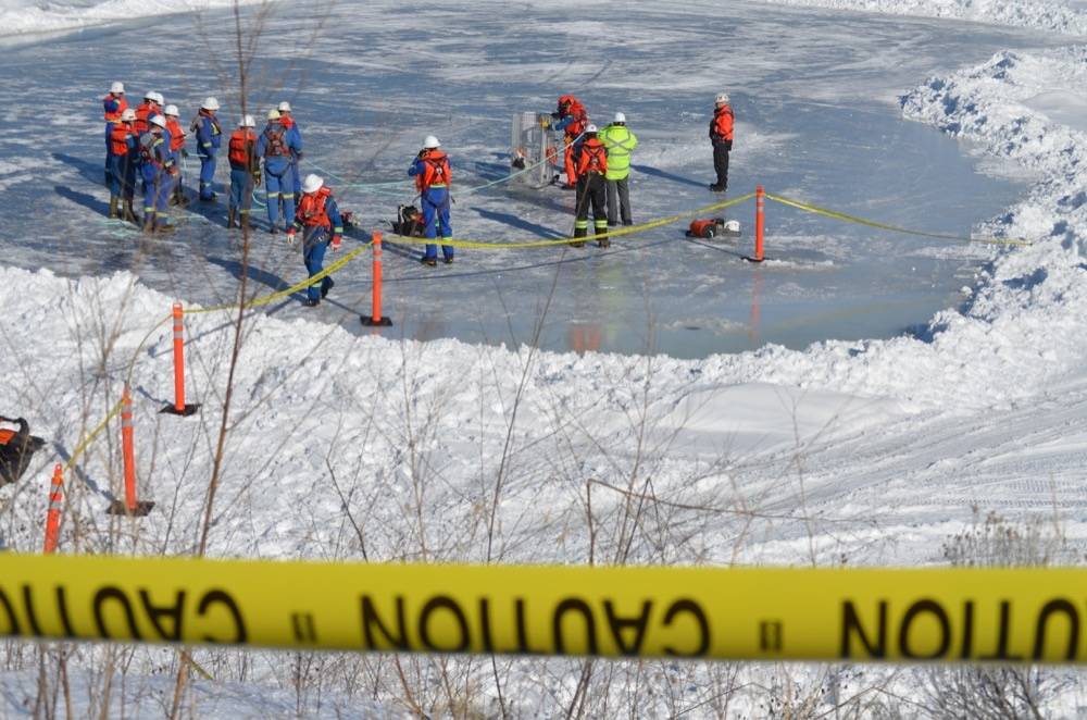 About 30 people partook in the Inks Lake exercise, which involved using what is essentially a chain saw on skis to cut into the ice. The machine is used to ensure the cutting of straight lines through the ice for long distances. (Michael Potestio/KTW)