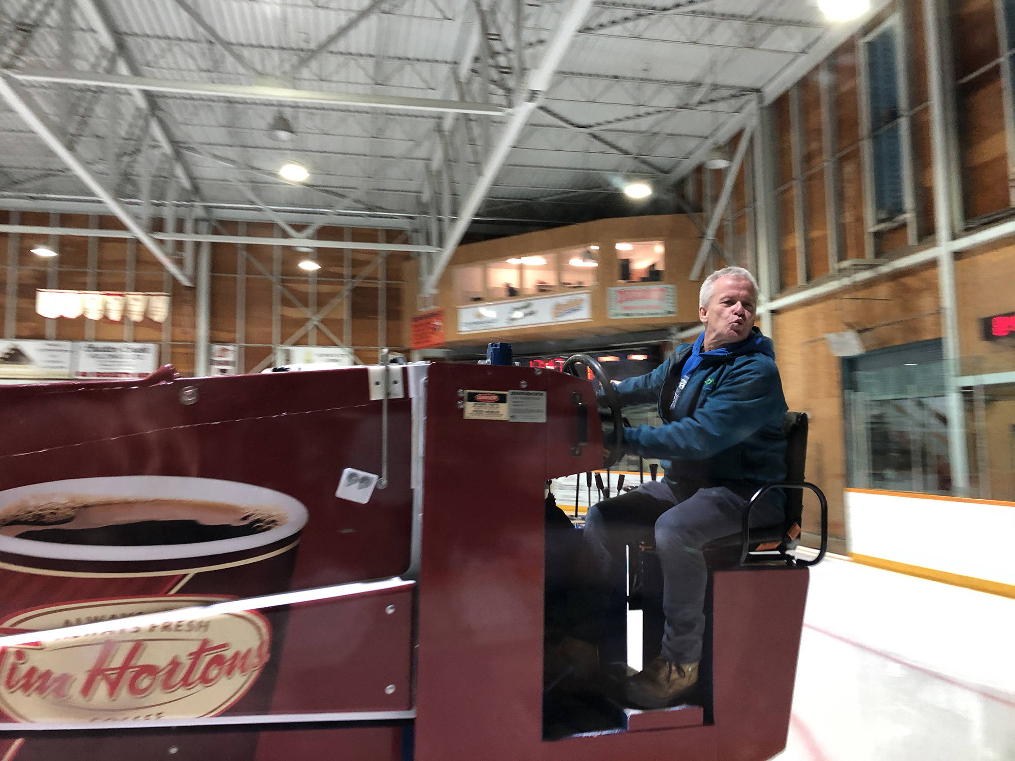 Golden’s Zamboni driver Robert Drummond blows a kiss to the fans as he cleans the ice between periods of the Rockets games. He has become known for his performances while he operates the Zamboni. (Claire Palmer photo)