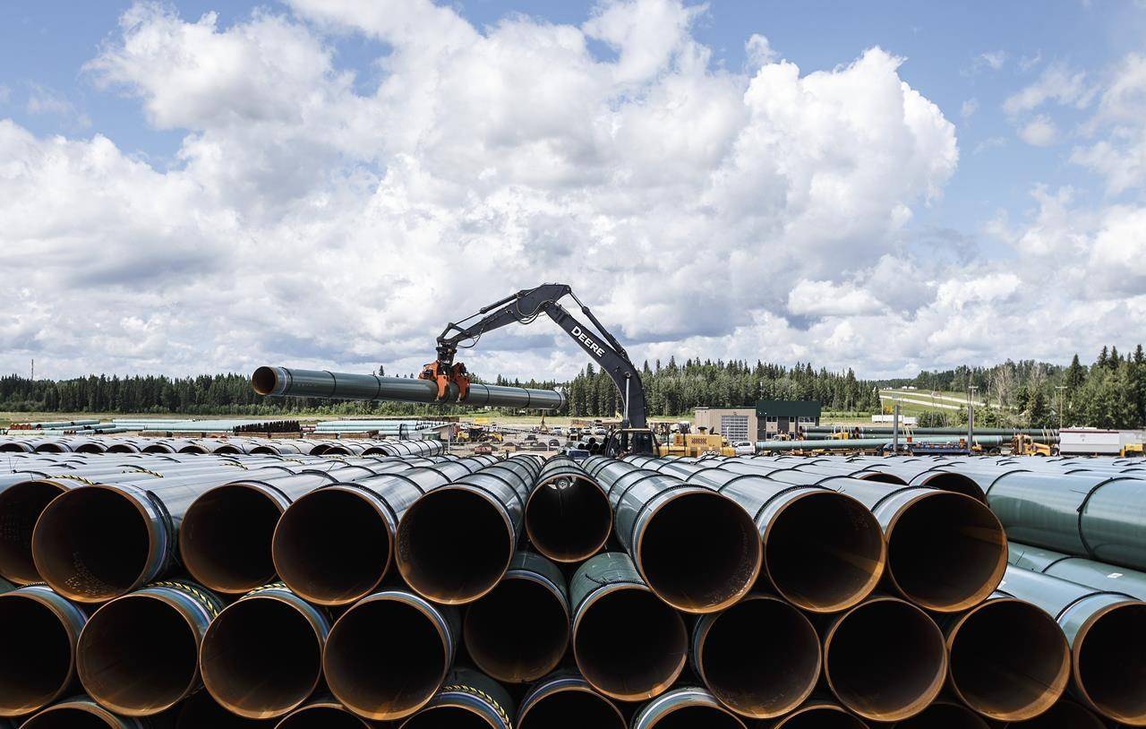 Pipe for the Trans Mountain pipeline is unloaded in Edson, Alta., Tuesday, June 18, 2019. The Trans Mountain pipeline expansion has cleared another legal hurdle. The Supreme Court of Canada has dismissed five leaves to appeal mounted by environment and Indigenous groups, all of which wanted the court to hear arguments about whether cabinet’s decision to approve the pipeline violated the Species at Risk Act due to fears the project would harm the highly endangered southern resident killer whales. THE CANADIAN PRESS/Jason Franson