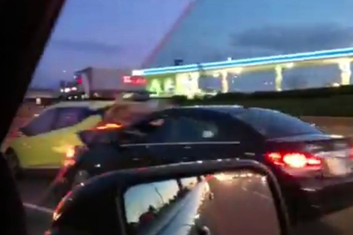 Police are not linking a motor vehicle accident Friday evening with a road rage incident caught on camera and posted to social media. (Screen grab)
