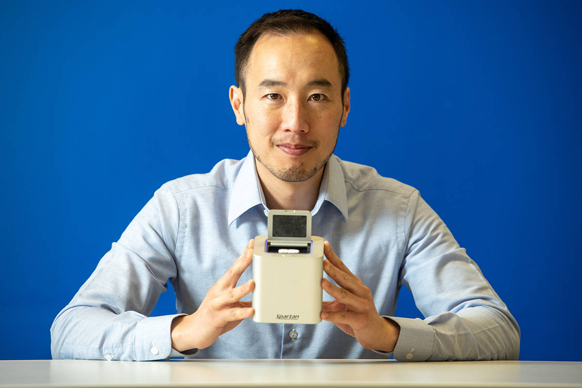 Spartan Bioscience Inc. CEO Paul Lem holds one of his company’s COVID-19 portable, rapid testing devices in a handout photo. Health Canada has approved the use of the device for testing for COVID-19. The Spartan Cube from Ottawa’s Spartan Bioscience is expected to help provide rapid tests in rural and remote areas such as Indigenous communities.THE CANADIAN PRESS/HO-Spartan Bioscience Inc. MANDATORY CREDIT