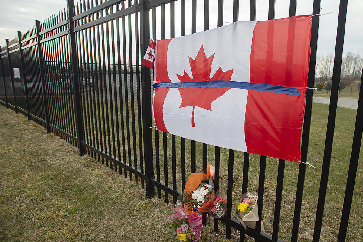 A tribute is seen at RCMP headquarters in Dartmouth, N.S. on Monday, April 20, 2020. Police say at least 17 people are dead, including RCMP Const. Heidi Stevenson, after a man, driving a restored police car, went on a murder spree in several Nova Scotia communities. Alleged killer Gabriel Wortman, 51, was shot and killed by police. THE CANADIAN PRESS/Andrew Vaughan