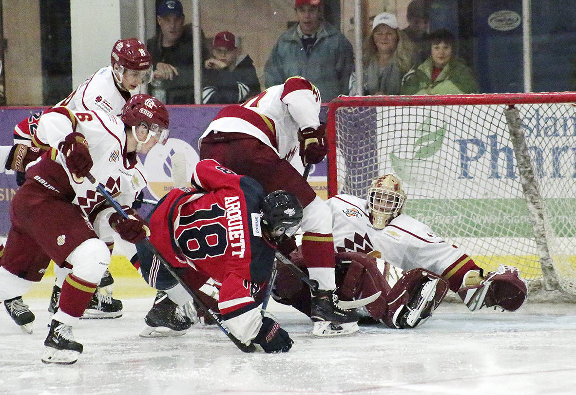 The Cowichan Valley Capitals and Chilliwack Chiefs battle in a game during the 2019-20 B.C. Hockey League season. (File photo)