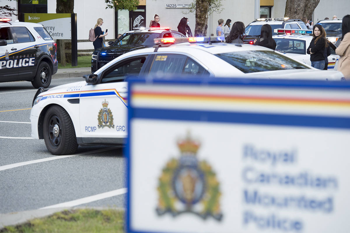 Members of B.C. law enforcement take part in a motorcade to honour fallen RCMP Const. Heidi Stevenson at the RCMP headquarters in Surrey, B.C. Thursday, April 30, 2020. Const. Stevenson was shot and killed in Nova Scotia on April 19th. THE CANADIAN PRESS/Jonathan Hayward