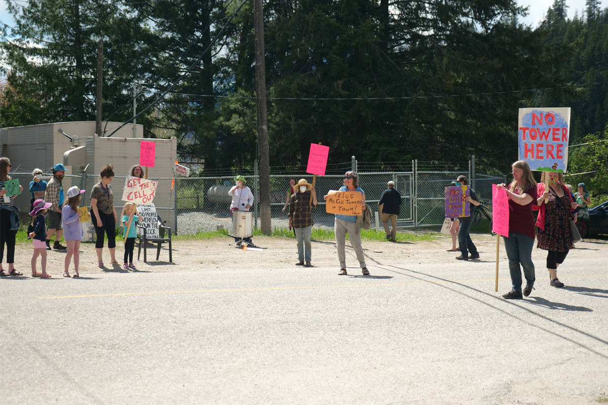 A group of concerned residents gathered Friday to protest the planned location of a Telus cell phone tower in Riondel. Photo submitted