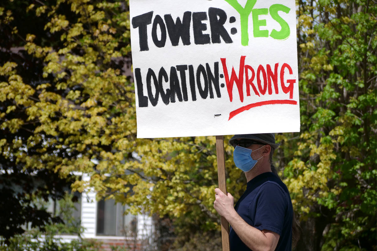 A protestor shows off their opposition last week to a planned cell phone tower Telus wants to build in Riondel. Residents have been staging demonstrations to keep the company from going ahead with construction. Photo submitted