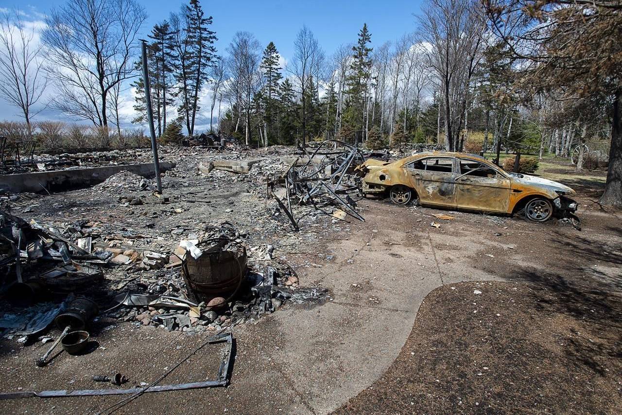 aA fire-destroyed property registered to Gabriel Wortman at 200 Portapique Beach Road is seen in Portapique, N.S. on Friday, May 8, 2020. A former neighbour of the gunman behind last month’s mass shooting in Nova Scotia says she reported his domestic violence and cache of firearms to the RCMP years ago and ended up leaving the community herself due to fears of his violence.THE CANADIAN PRESS/Andrew Vaughan