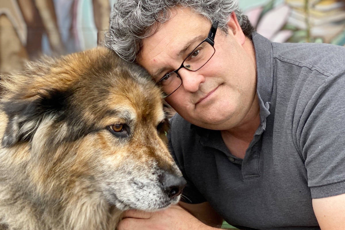 Dr. Adrian Walton with his 7-year-old Australian shepherd cross named Indy.(Contributed)