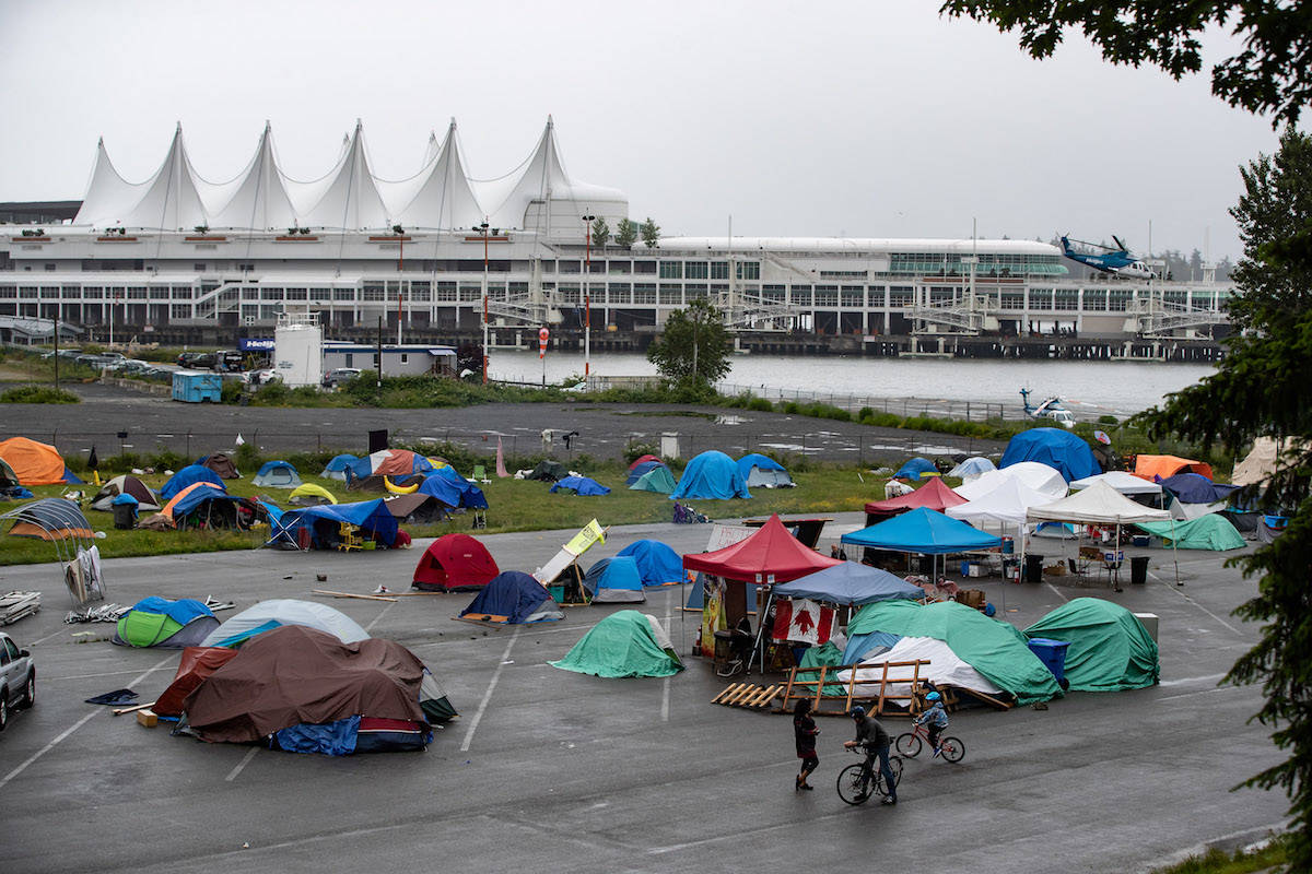 Tents where approximately 150 people were camped at a parking lot on Port of Vancouver property adjacent to Crab Park, in Vancouver, B.C., Wednesday, June 10, 2020. The encampment was set up after a tent city at Oppenheimer Park was shut down due to concerns about COVID-19. THE CANADIAN PRESS/Darryl Dyck