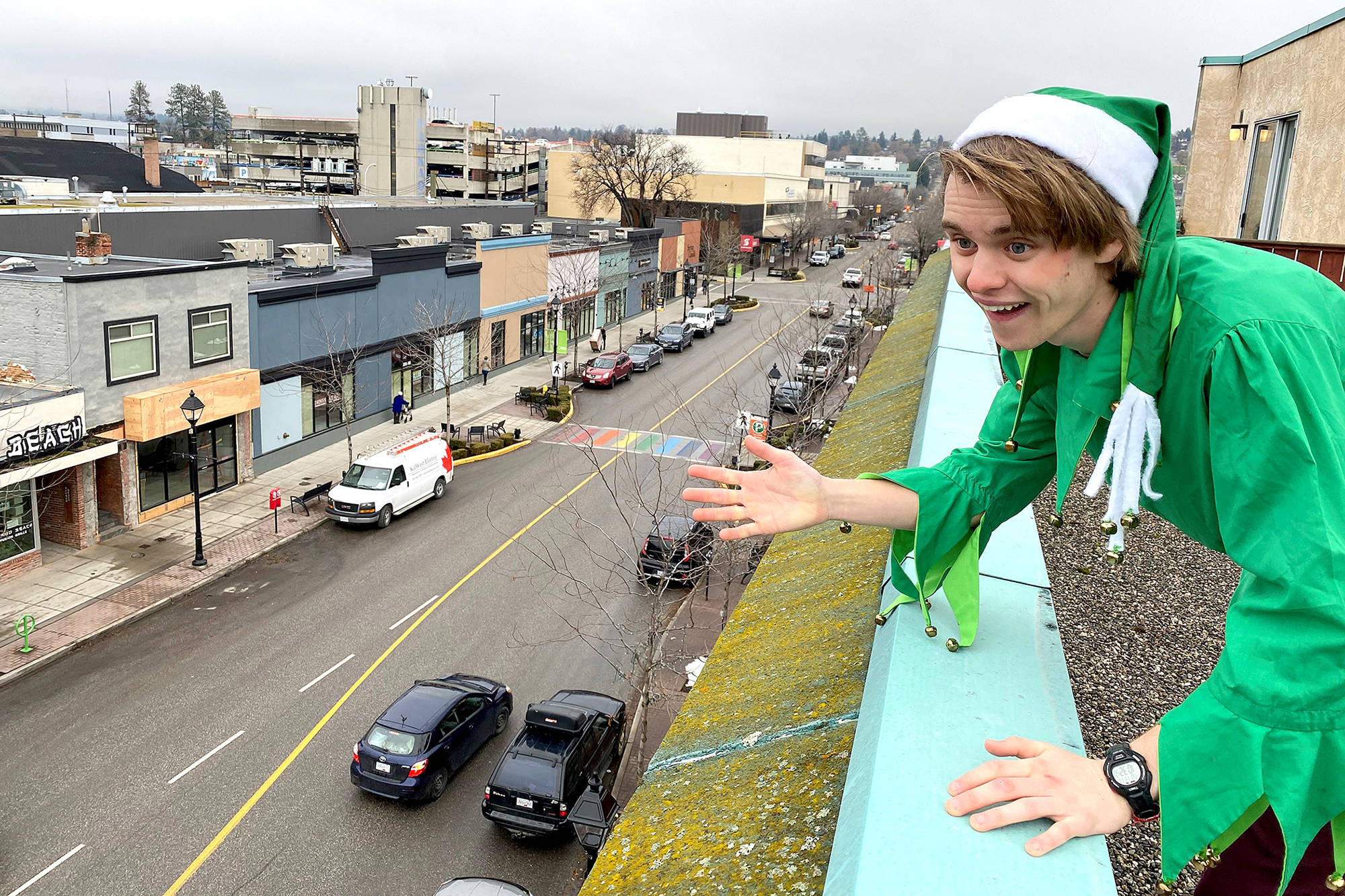 A Christmas elf has been seen and heard shouting from rooftops that Santa is coming to town Nov. 27. (Downtown Vernon Association photo)