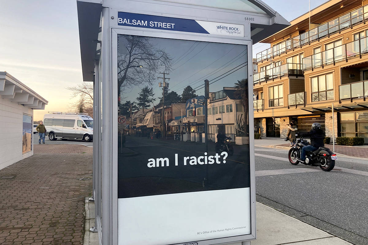 A bus shelter in White Rock is emblazoned with an ad from B.C.’s Office of the Human Rights Commissioner on Sunday, Nov. 29, 2020. (Black Press Media files)