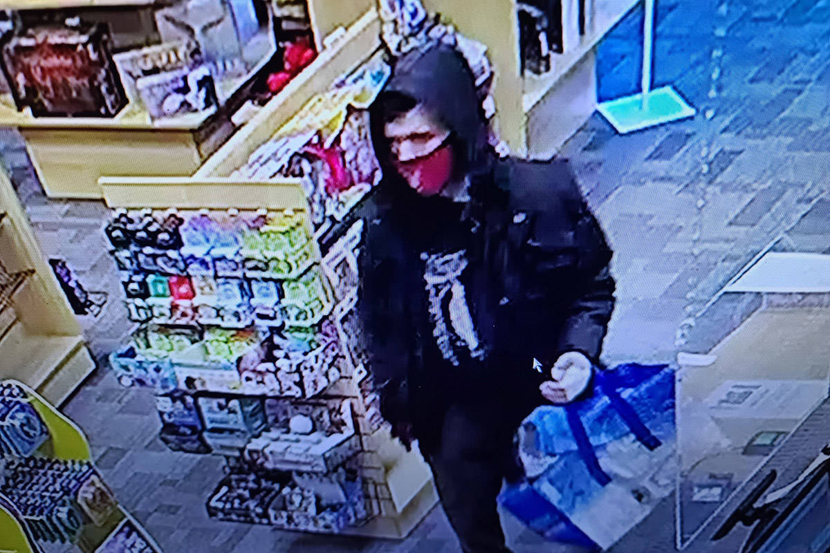 Police are looking for a man shown on a store security tape that they believe stole Magic the Gathering cards while brandishing a sword. (T&N Games)