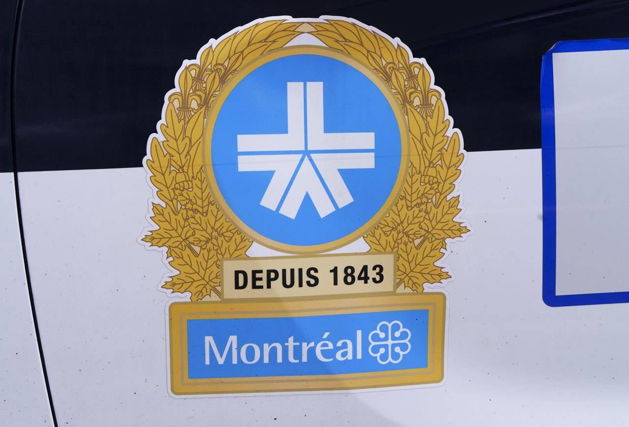 The Montreal Police logo is seen on a police car in Montreal on Wednesday, July 8, 2020. THE CANADIAN PRESS/Paul Chiasson