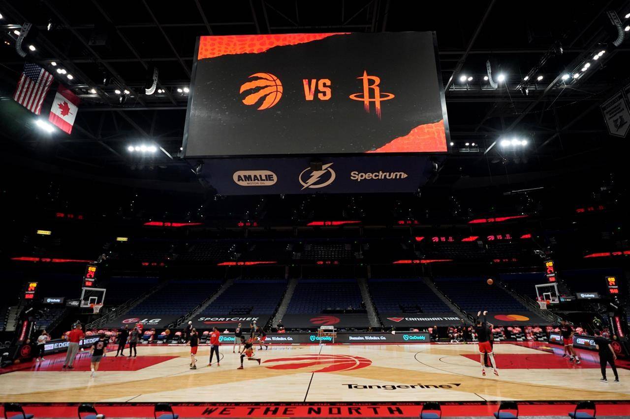 Some members of the Toronto Raptors and Houston Rockets take part in a shoot around before an NBA basketball game Friday, Feb. 26, 2021, in Tampa, Fla. THE CANADIAN PRESS/AP, Chris O’Meara