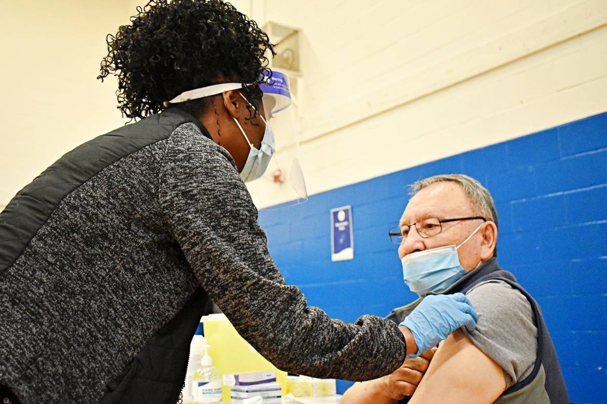 Alex Campbell First Nations Elder and Knowledge Holder from Lax Kw’alaams is the first senior citizen to receive a COVID-19 vaccination at the community clinic in Prince Rupert on March 14. (Photo: K-J Millar/The Northern View)
