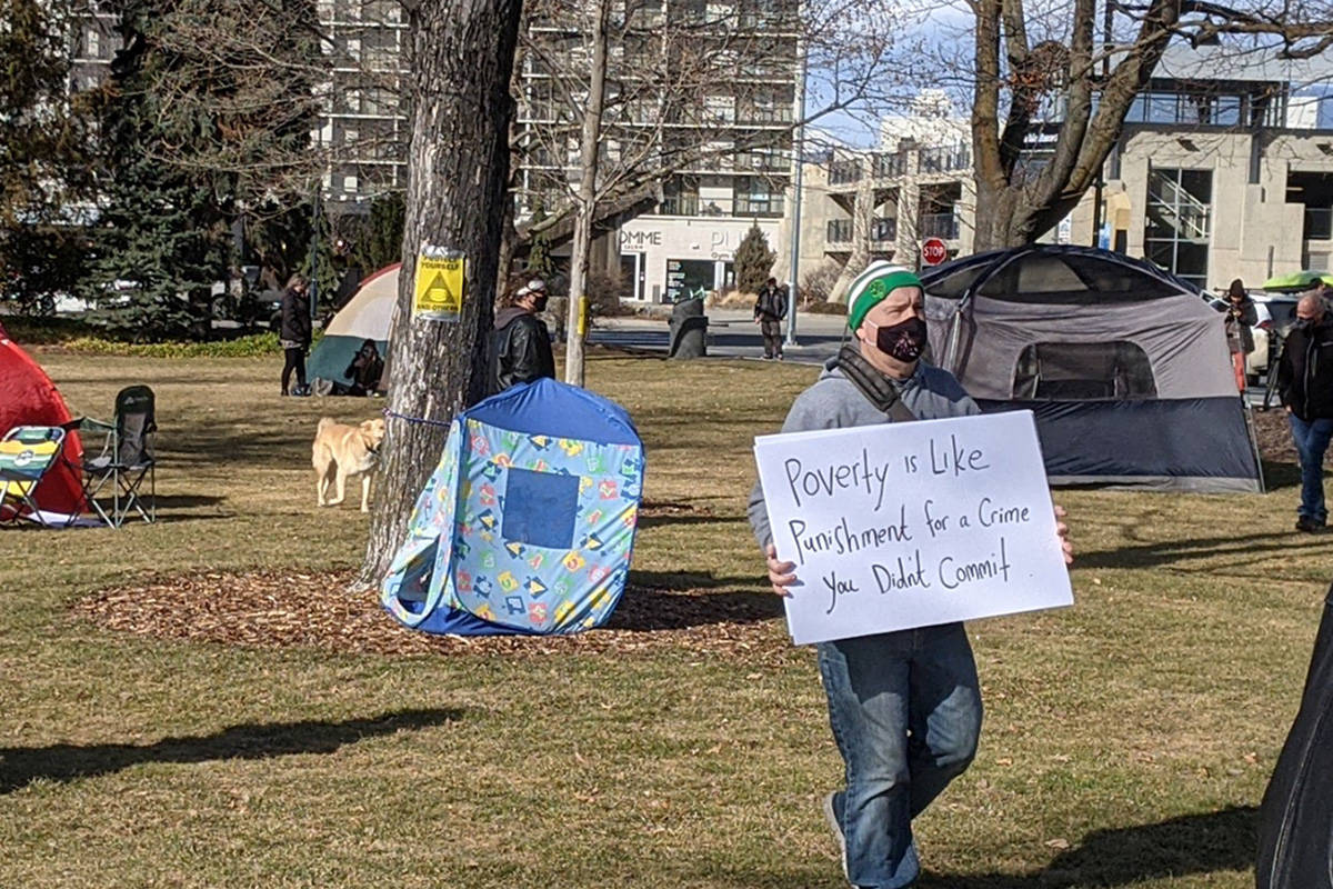 Approximately 50 protesters gathered at Gyro Park in Penticton Friday, March 5 to protest council’s decision to close Victory Church Shelter. (Jesse Day - Western News)