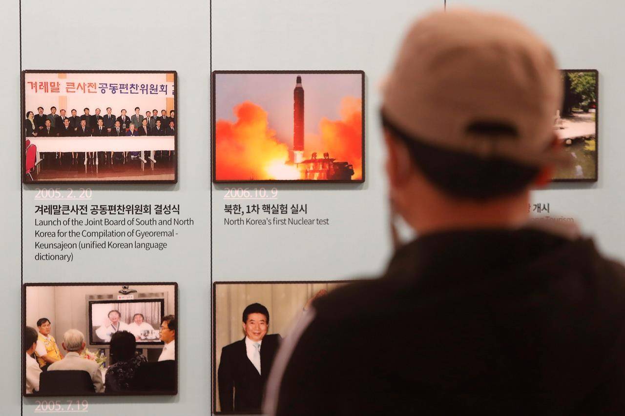 A photo showing North Korea’s missile launch is displayed at the Unification Observation Post in Paju, near the border with North Korea, South Korea, Wednesday, March 24, 2021. North Korea fired short-range missiles this past weekend, just days after the sister of Kim Jong Un threatened the United States and South Korea for holding joint military exercises. (AP Photo/Ahn Young-joon)