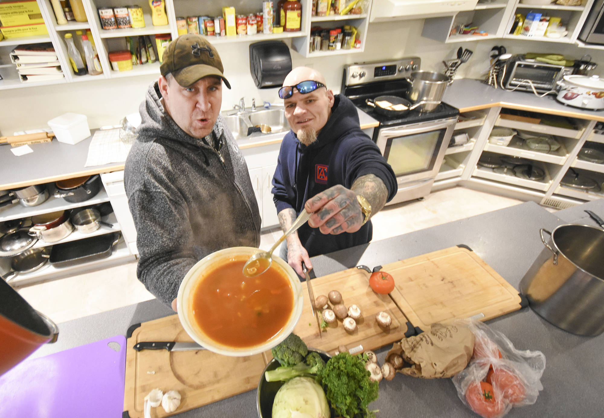 Cavin Noonan, left, and Terry Fussey of Discovery House with their soup creation for a previous Soup is Good Food fundraiser. (File photo - Western News)