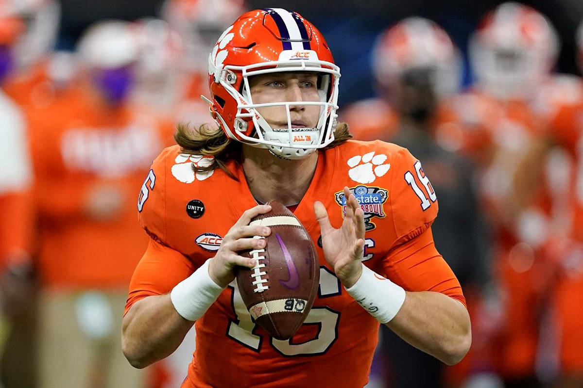Clemson quarterback Trevor Lawrence passes against Ohio State during the first half of the Sugar Bowl NCAA college football game in New Orleans, in this Friday, Jan. 1, 2021, file photo. (AP Photo/John Bazemore, File)