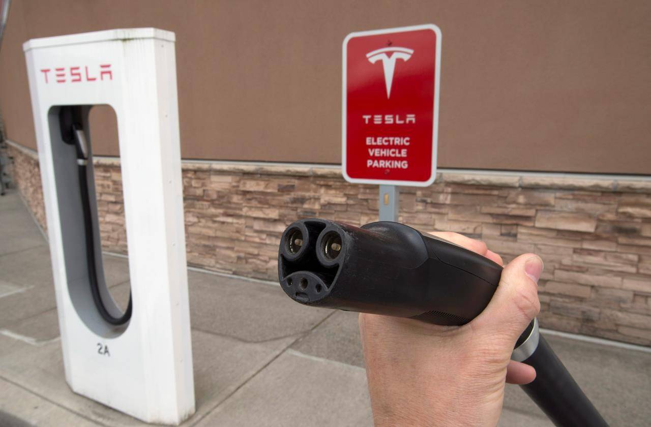 A Tesla charging centre is pictured in Squamish, B.C., Tuesday, June, 1, 2016. More than $100 million in federal rebates designed to make electric vehicles more affordable to low and middle-income Canadians has gone to those buying a Tesla, government records show. THE CANADIAN PRESS/Jonathan Hayward