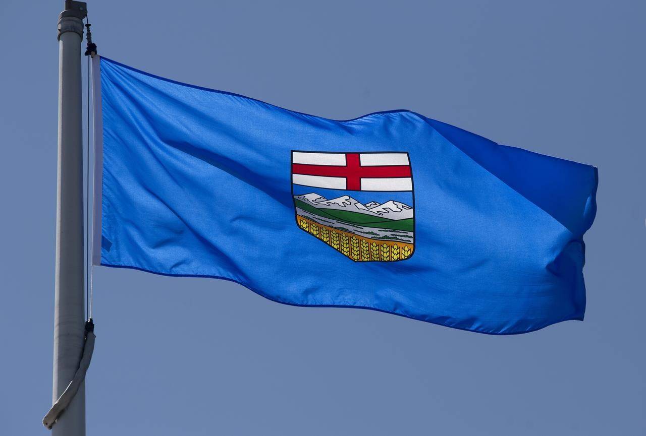 Alberta’s provincial flag flies in Ottawa on Monday, July 6, 2020. A $600 fine was issued after a gender-reveal party led to a wildfire in Alberta. THE CANADIAN PRESS/Adrian Wyld