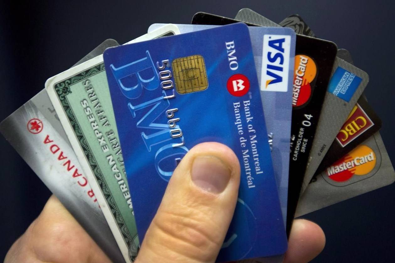 Credit cards are displayed in Montreal, Wednesday, Dec. 12, 2012. Equifax says the debt profile of Canadians has changed throughout the pandemic, with mortgages accounting for a larger portion of people’s debt. THE CANADIAN PRESS/Ryan Remiorz