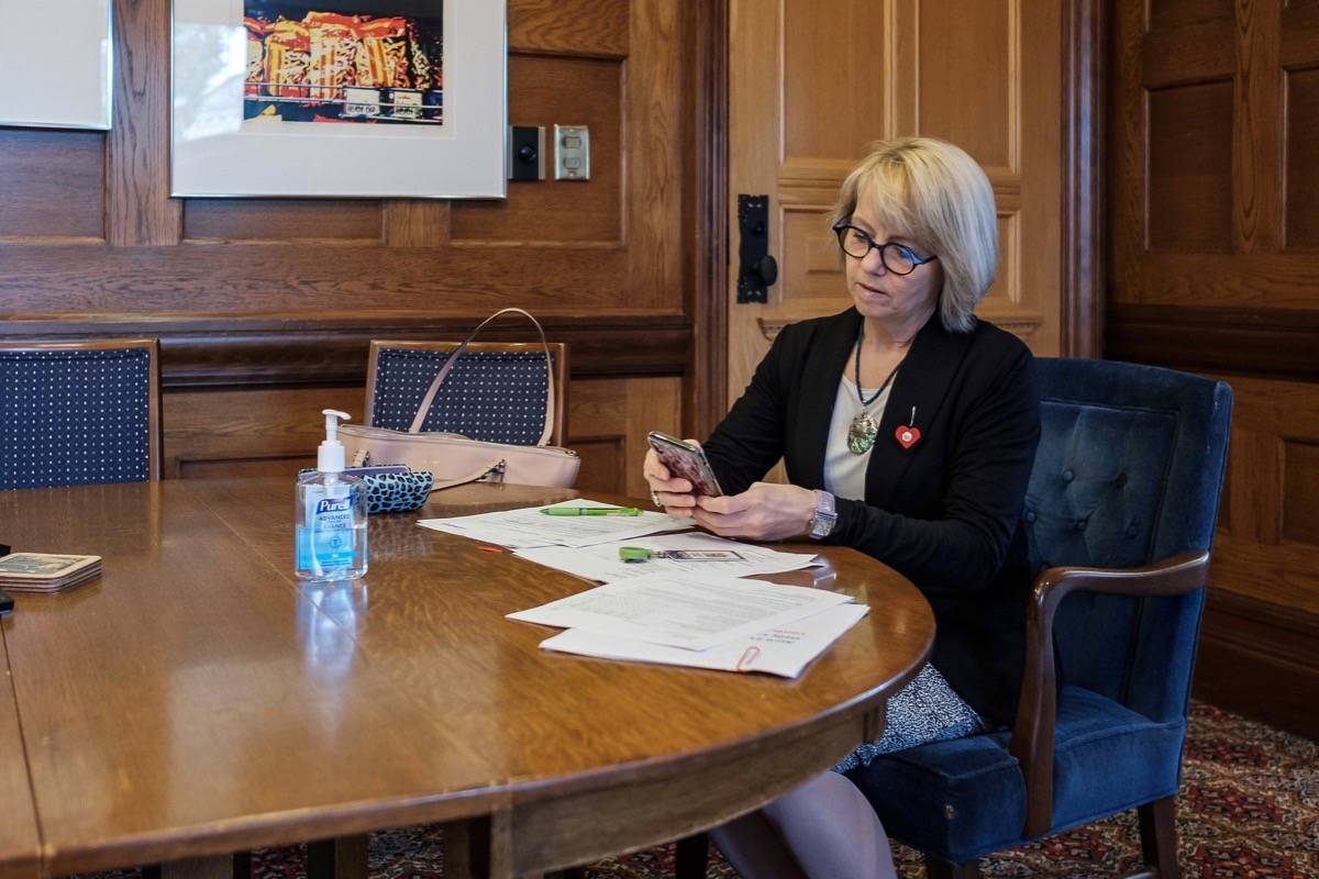 Provincial health officer Dr. Bonnie Henry prepares a daily update on the coronavirus pandemic, April 21, 2020. (B.C. Government)