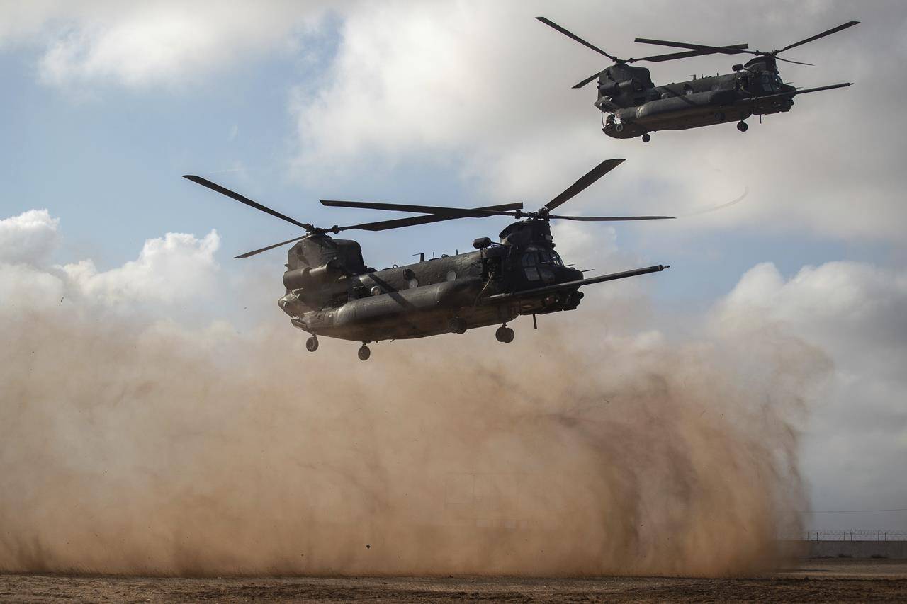 Helicopters carrying U.S and Moroccan special forces take part in a drill as part of the African Lion military exercise, in Tafraout base, near Agadir, Morocco, Monday, June 14, 2021. With more than 7,000 participants from nine nations and NATO, African Lion is U.S. Africa Command's largest exercise. (AP Photo/Mosa'ab Elshamy)