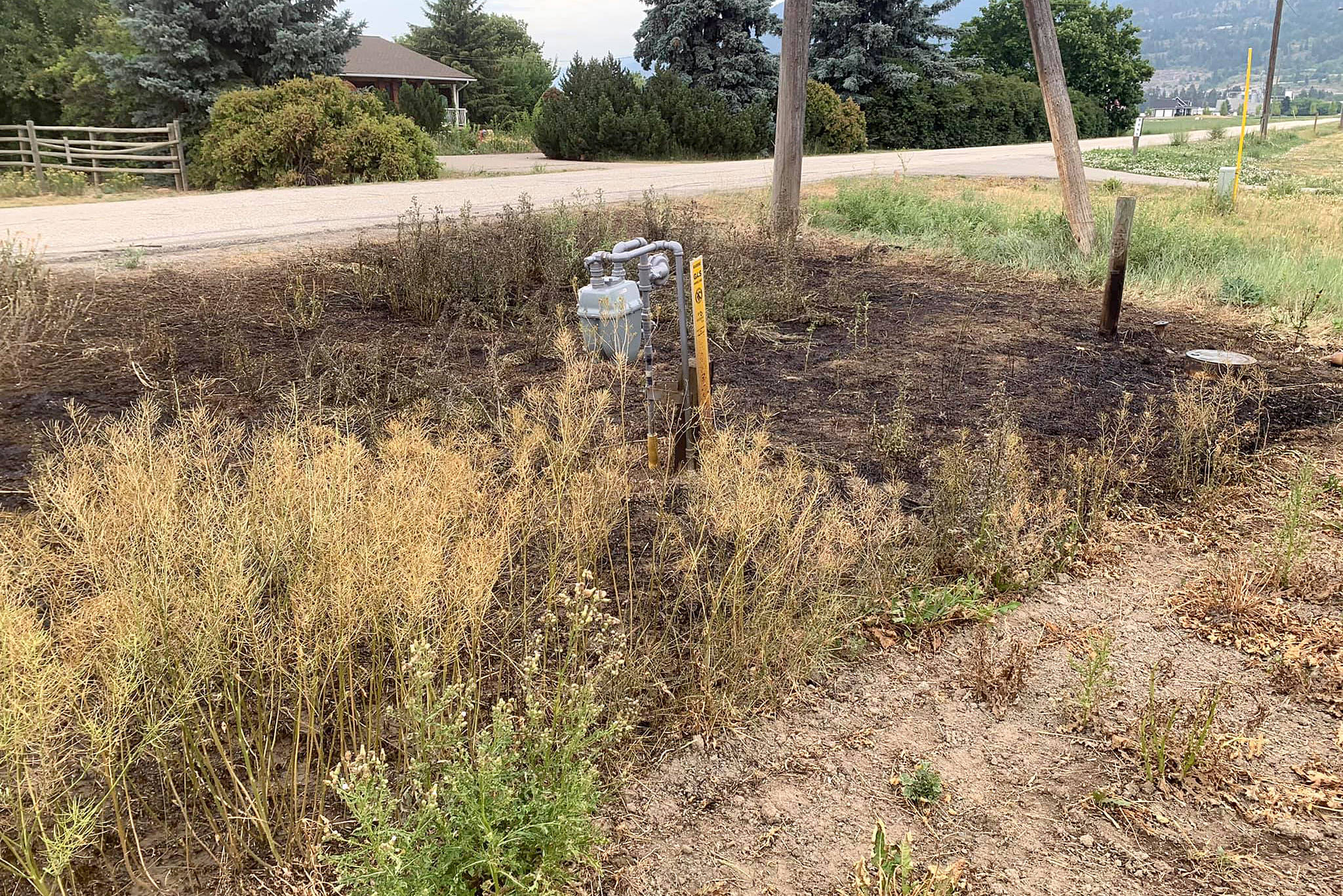A grass fire was sparked in Armstrong, suspected to be caused by someone driving by and discarding a cigarette butt. (Clint Attfield photo)