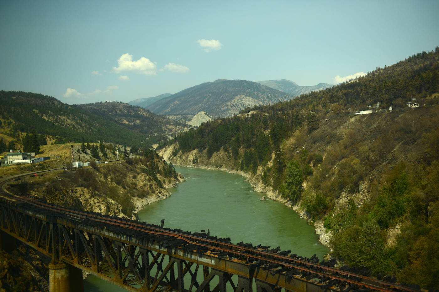 A railway bridge is seen burnt in Lytton, B.C. on Friday, July 9, 2021, nine days after a wildfire ripped through the village on June 30, 2021. (Jenna Hauck/ Black Press Media)