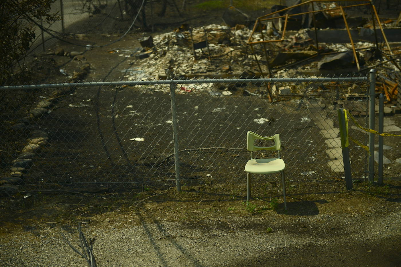 A chair sits on Main Street in Lytton, B.C. on Friday, July 9, 2021, nine days after a wildfire ripped through the village on June 30, 2021. (Jenna Hauck/ Black Press Media)