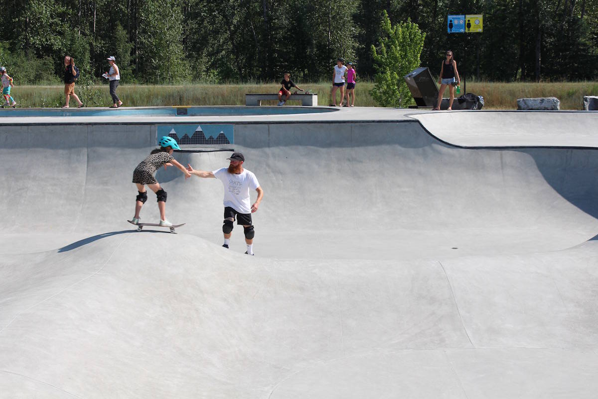 A Skate Camp coach makes sure that safety and progression go hand-in hand on July 9. (Photo: Tim van der Krogt)