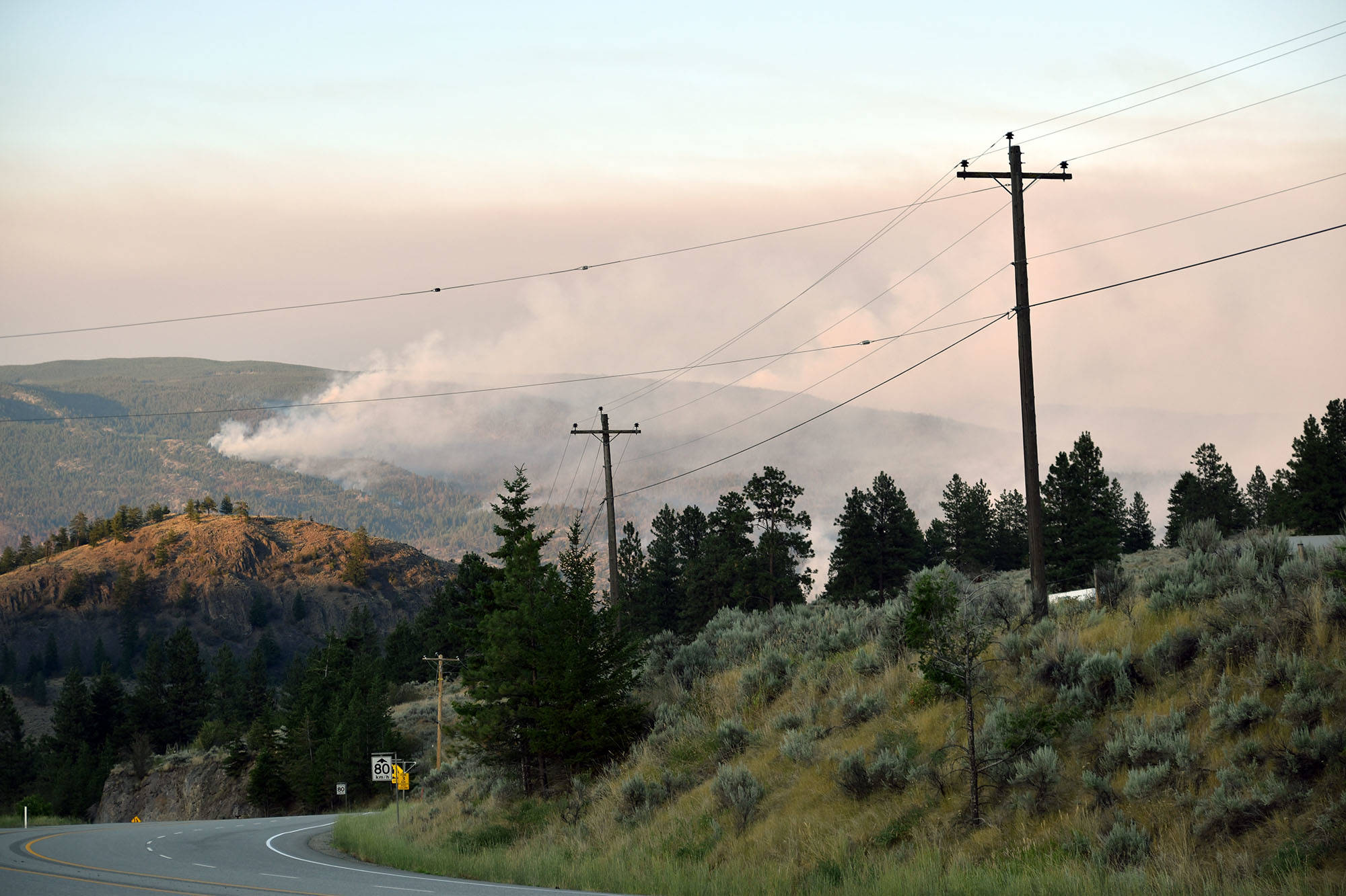 The Thomas Creek Fire seen from Highway 3 on Thursday evening, July 15. (Brennan Phillips - Western News)