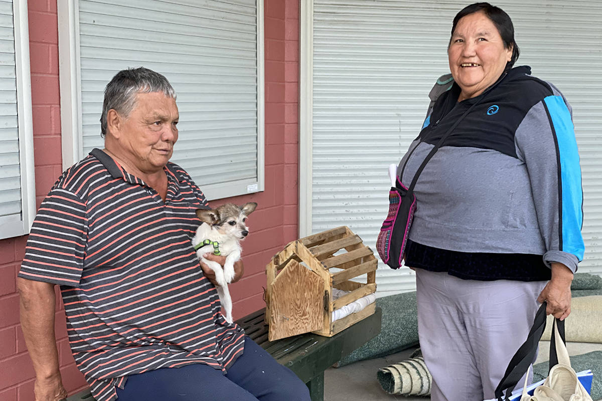 Ulkatcho First Nation members Steve Cahoose and Margaret Charleyboy evacuated from their home out west to Williams Lake with their dog scruffy. The couple plan to stay in Williams Lake with relatives. (Angie Mindus photo - Williams Lake Tribune)