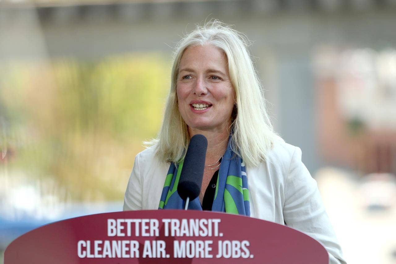 Minister of Infrastructure and Communities Catherine McKenna talks about the recent transit announcement during a press conference at Surrey City Hall in Surrey, B.C., on Friday, July 9, 2021. THE CANADIAN PRESS/Chad Hipolito