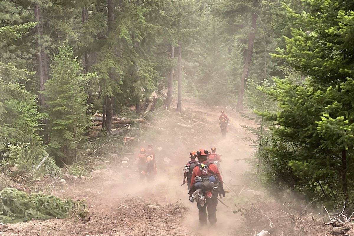 B.C. forest firefighters head into an area south of Lytton to perform a back-burn, June 17, 2021. (B.C. Wildfire Service)