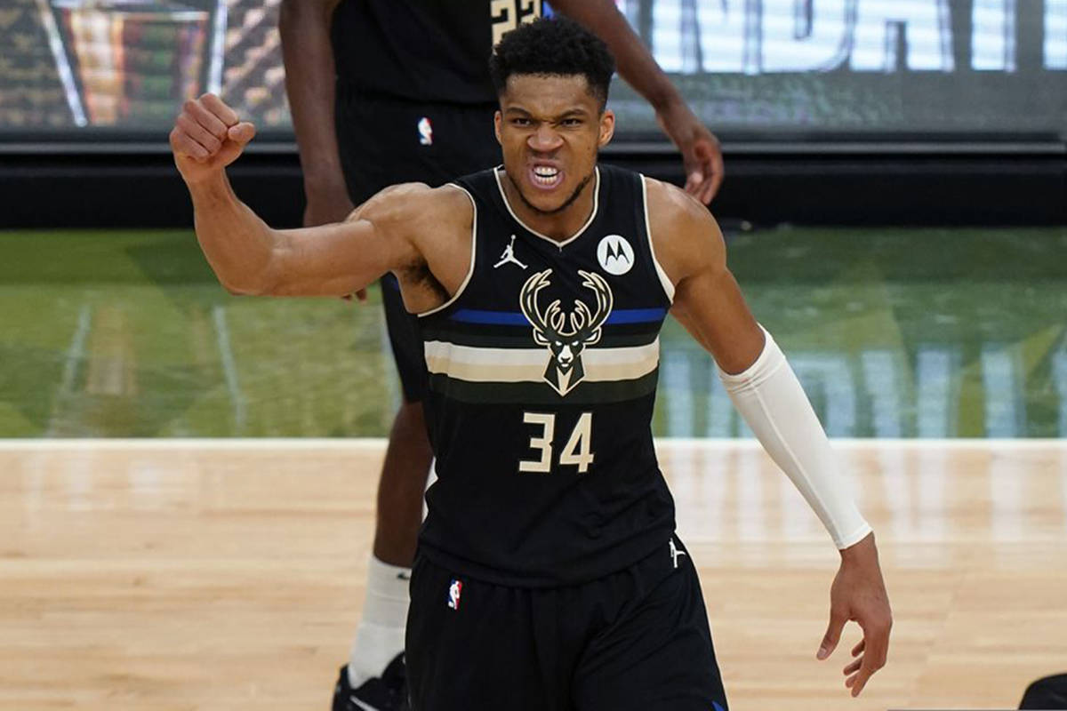 Milwaukee Bucks forward Giannis Antetokounmpo (34) reacts during the second half of Game 6 of basketball’s NBA Finals against the Phoenix Suns in Milwaukee, Tuesday, July 20, 2021. (AP Photo/Paul Sancya)