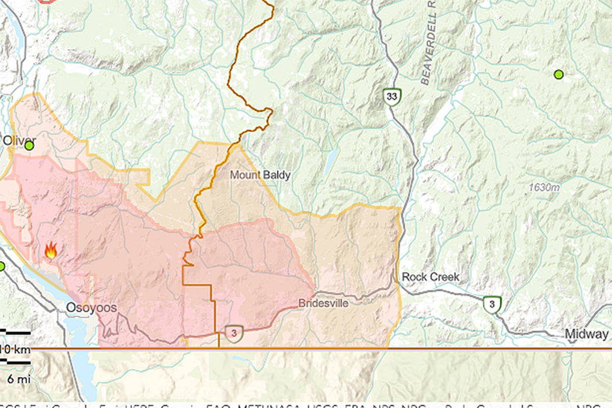 The B.C. Wildfire Dashboard shows West Boundary areas under evacuation order (pink) and under emergency alert (peach) as of 6:30 p.m., Thursday, July 22.
