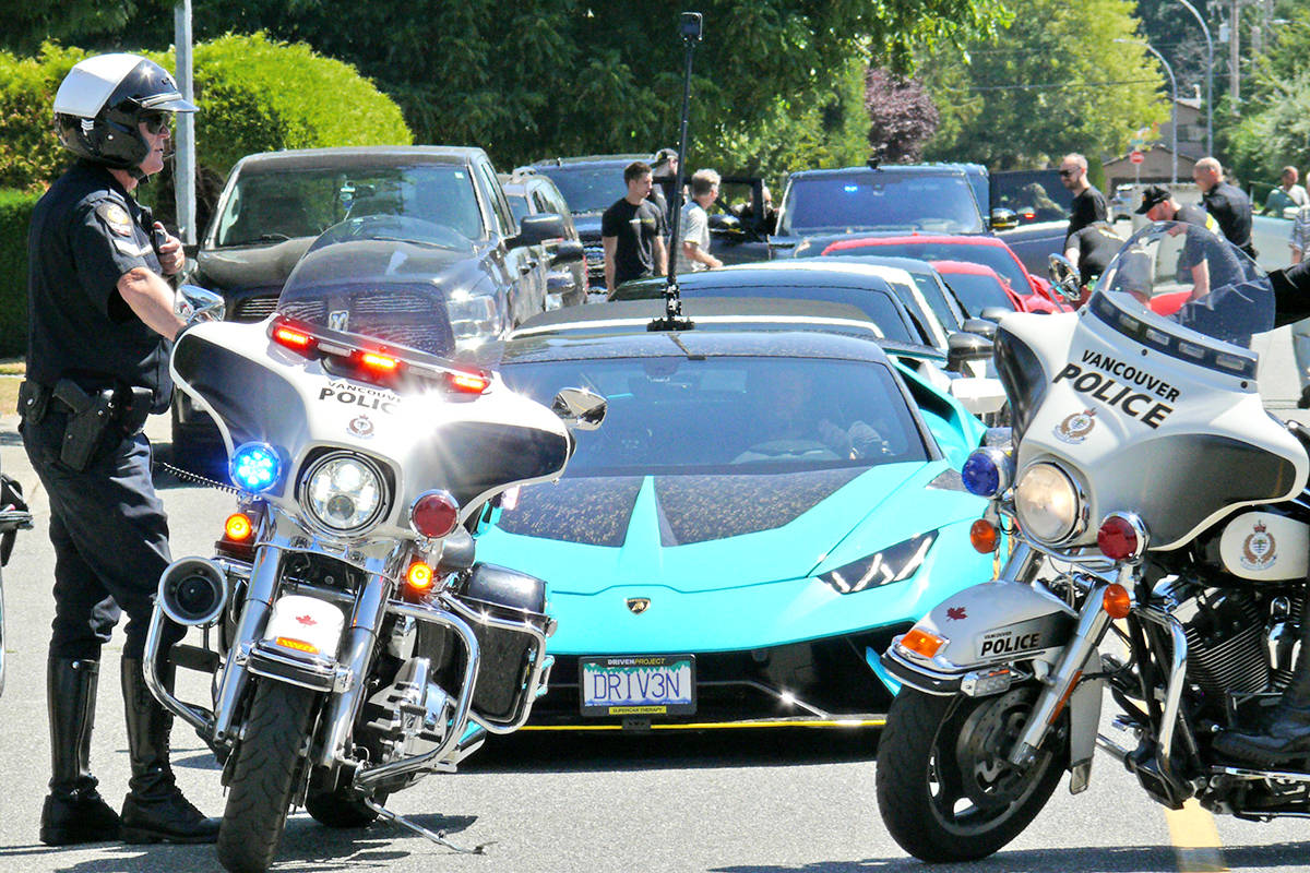 A fleet of supercars filled a quiet Langley City street to visit Langley City teen Alyssa Anderson on Sunday, July 25, as part of the Drive Project. (Dan Ferguson/Langley Advance Times)