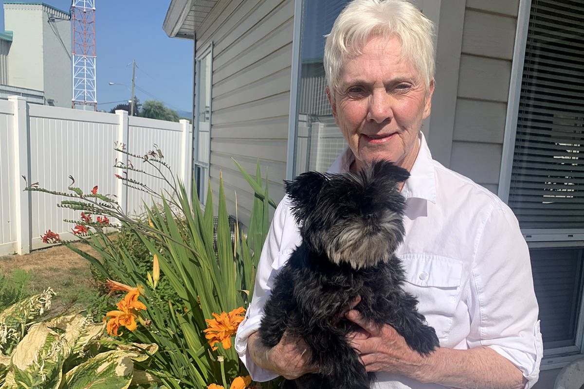 Bonnie Ball of Chilliwack, pictured her with her dog Trudy on July 26, 2021, was the victim of a telephone fraud costing her $44,000. (Paul Henderson/ Chilliwack Progress)